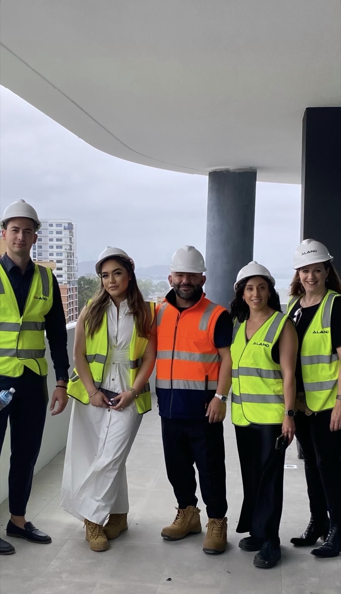 A project team together on a construction site